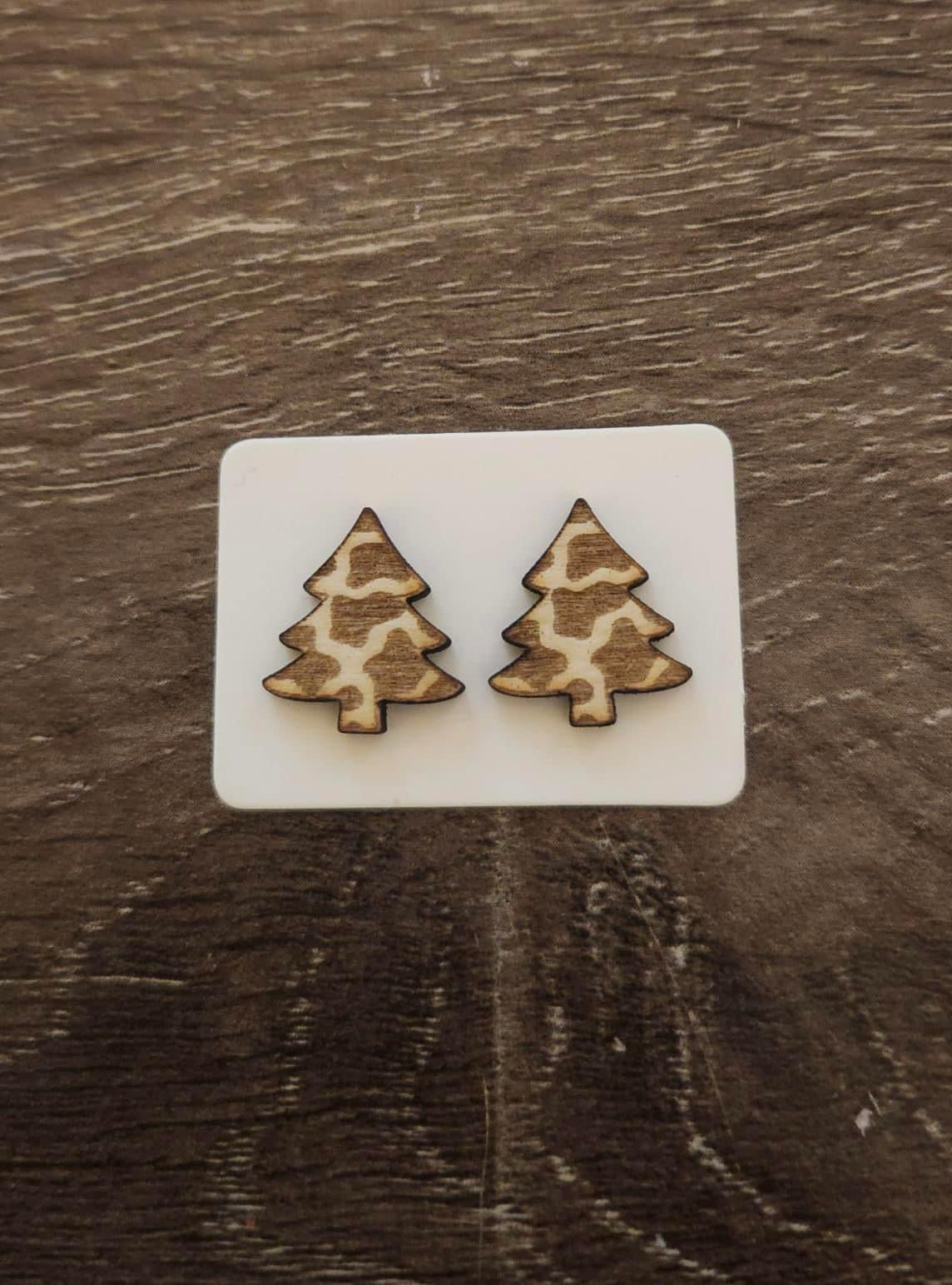 Christmas trees cow print earrings